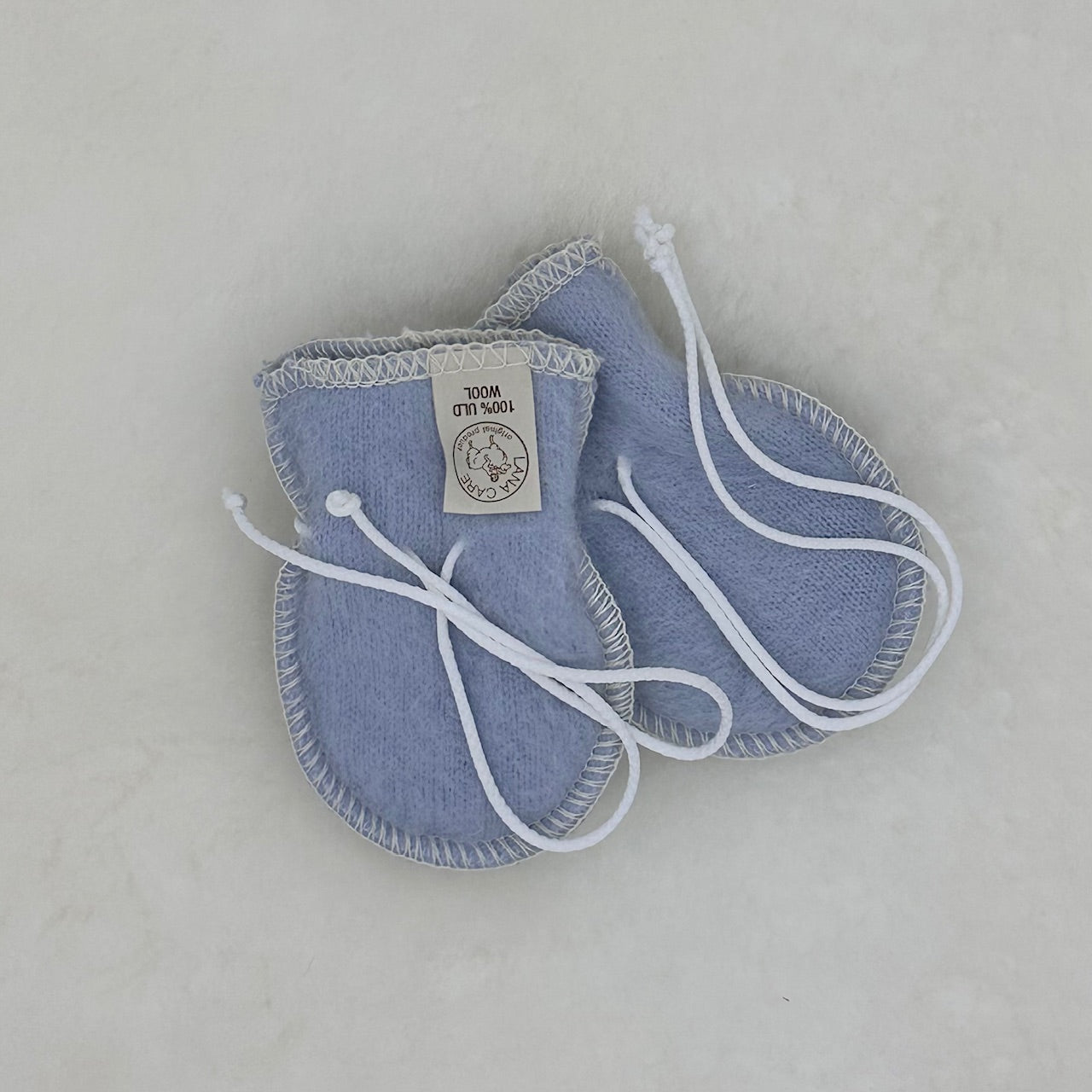 OUTLET LANACare Baby Mittens in Organic Merino Wool - synthetic ties