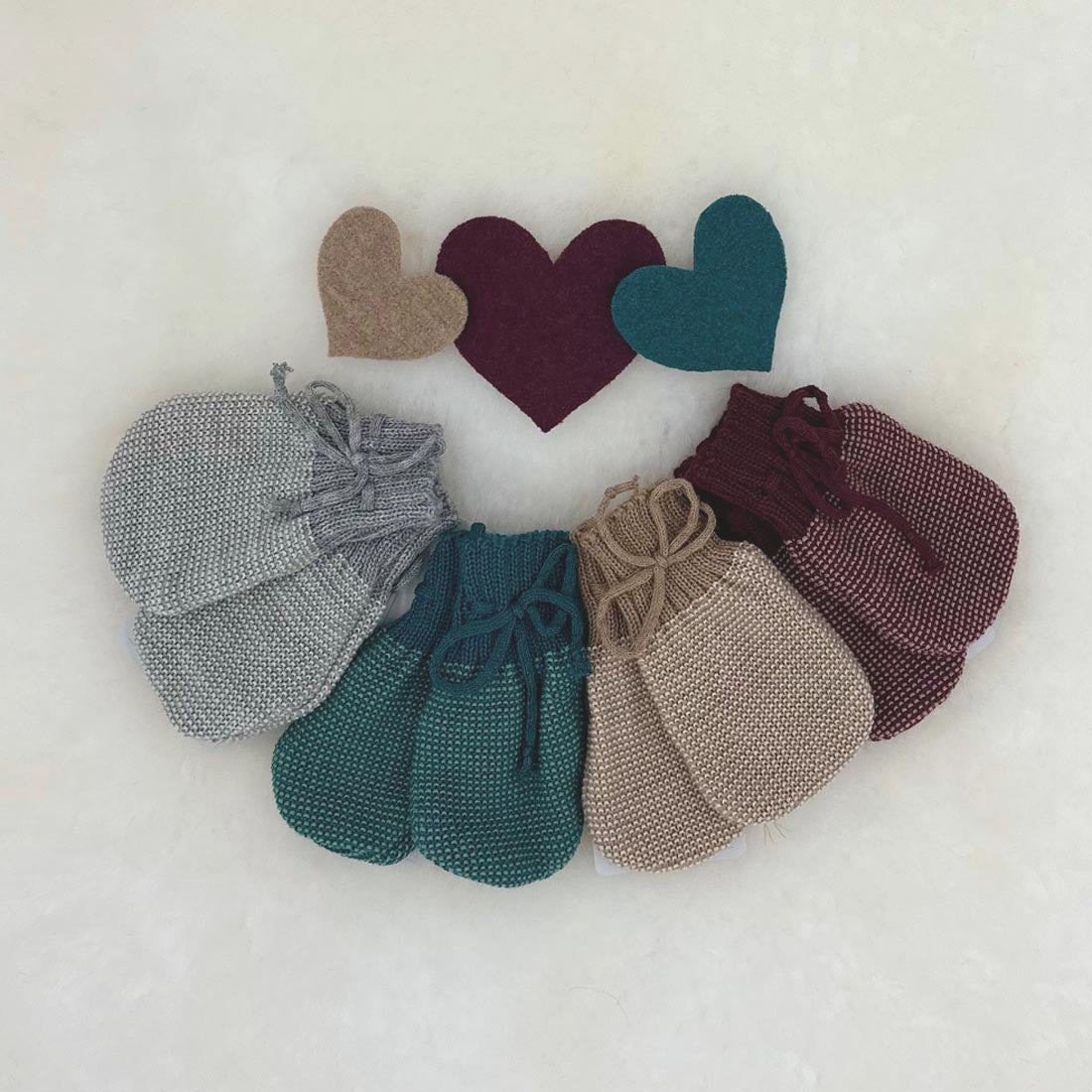 DISANA Knitted Baby Mittens in Organic Merino Wool